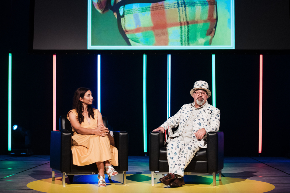 Comedian panelist at ASB waterfront theatre during event.
